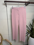 Pantalone tessuto nido d'ape, zip e bottoncino, elasticato dietro. Tasche laterali e taschina finta dietro,colore rosa- Maryley